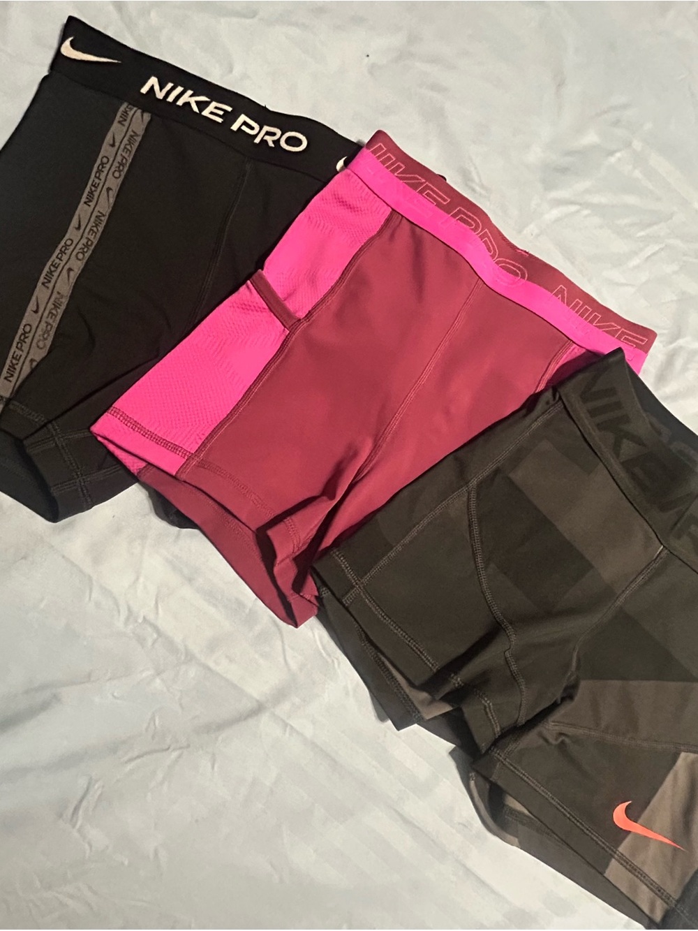 Nike Women's Training Shorts Trio in Black and Magenta